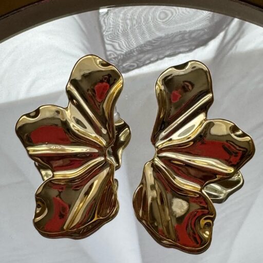 Aros de flor dorados de acrílico