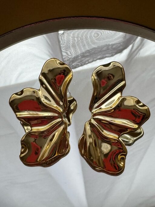 Aros de flor dorados de acrílico